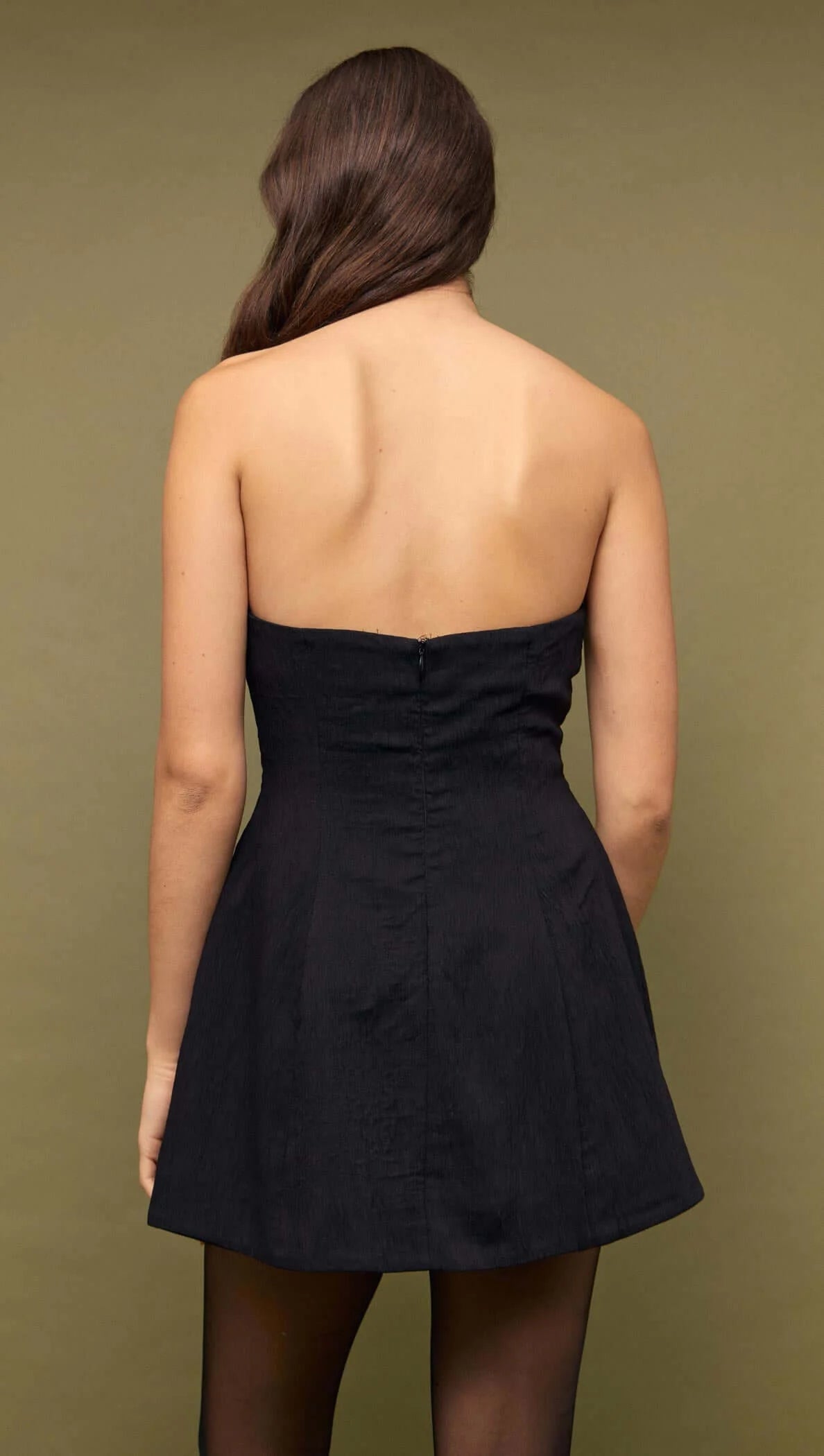 BLACK STRAPLESS PEPLUM MINI DRESS
